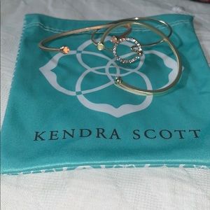 3 bracelets. 2 Kendra Scott. Plus teal bag